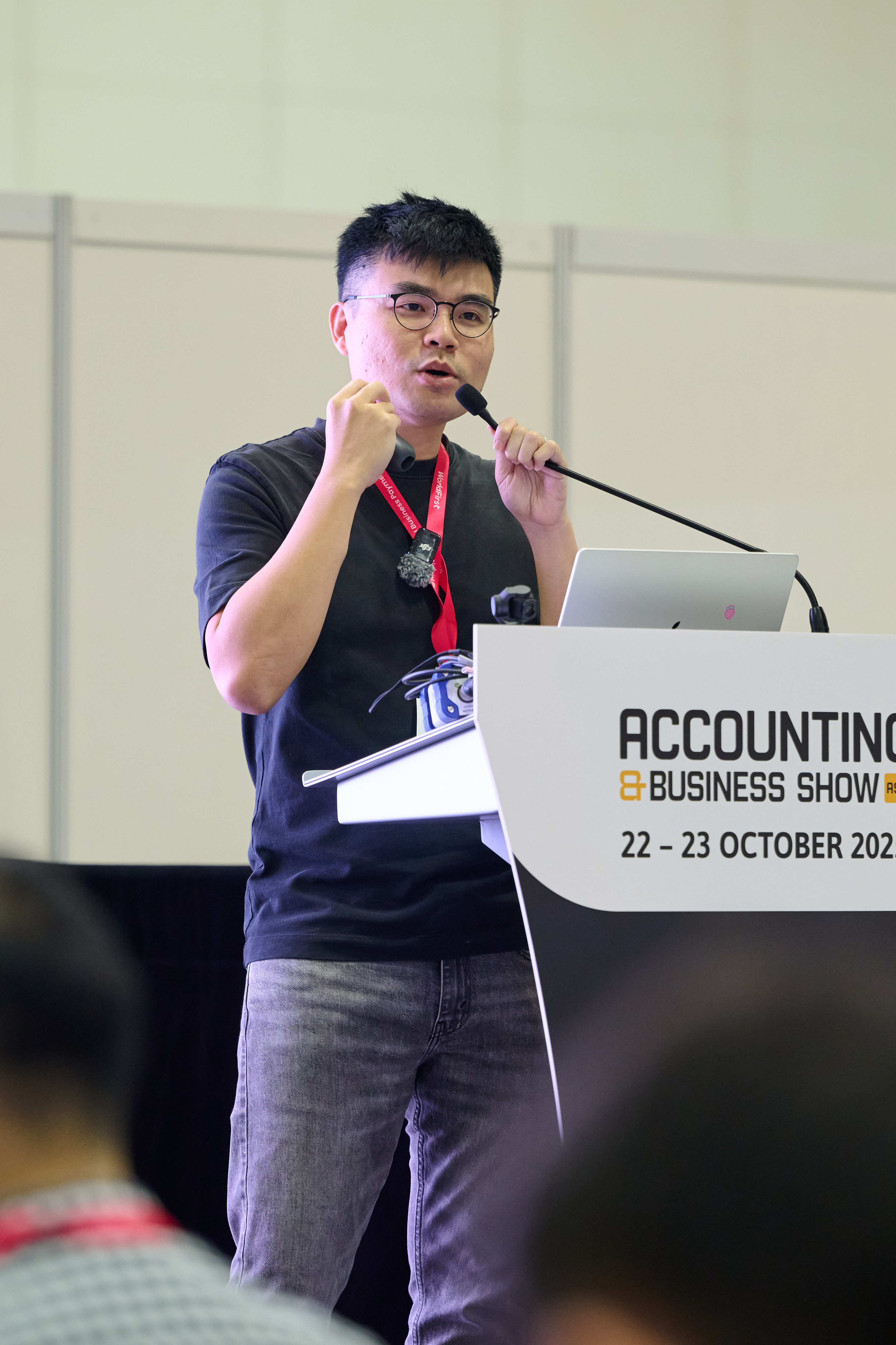 Issac Liu speaking at the Accounting & Business Show Singapore